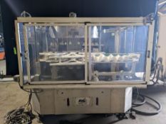 Qty (1) PE Rotary Hot Melt Cut and Stack Labeler - PE Model Futura Rotary Labeler - Hot Melt / Cut