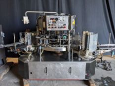 Krones 16 Head Cold Glue Labeler - 16 Head Turret with 5-1/2” Tables on 8” Centers - Front, back and