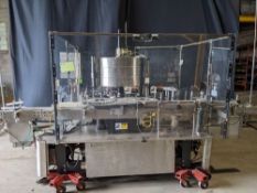 Krones 12 Head Autocol Rotary Pressure Sensitive Labeler - Vertical Dual label feed assemblies