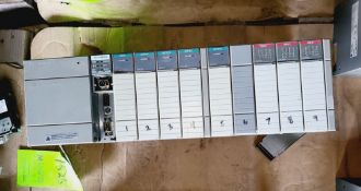 Qty (1) Allen Bradley SLC 5/04 - 9 Slot - 1 Analogue Input - 4 Analogue Outputs - 3 115 Volt Inputs
