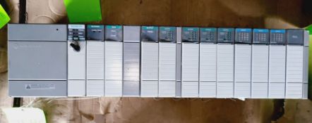 Qty (1) Allen Bradley SLC 5/05 - 12 slot - 1 Scanner Card - 1 DCM Card - 5 Digital Output Cards -