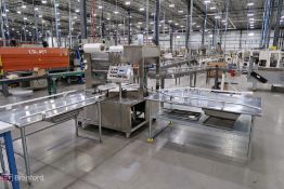 Rotary canister filling and sealing machine