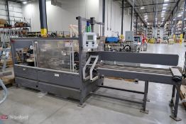Pearson packing system automatic tapper