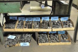 Lot-Various Hold Down Tooling in (12) Boxes Under (1) Bench
