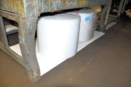 Lot-(2) Rolls of Shipping Foam Under (1) Table
