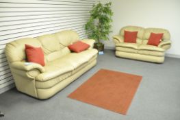 Lot-(2) Leather Sofas with (2) Artificial Plants and (1) Swivel Arm Chair (Upstairs)