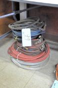 Lot-Air Hoses and Plastic Tubing in (1) Stack on Floor Under (1) Table