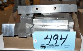 Lot-Various Machine Vise Jaws in (1) Box Under (1) Bench