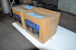 Lot-Walnut Shell Blast Media in (2) Boxes Under (1) Table