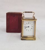 Brass and five-glass carriage clock in leather case, with Roman numerals to the dial, 11cm high