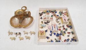 Gilt metal and mother-of-pearl shell chamber candlestick, the handle in the form of a serpent and