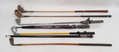 Old ebonised wood and bone walking stick, umbrella and sundry wooden and iron golf clubs