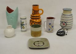 West German orange ground lava vase and other items of pottery, the vase with ovolos in brown