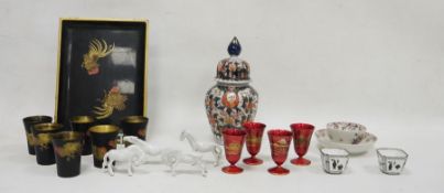 Chinese Imari pattern fluted baluster vase and cover, 23cm high, a set of lacquered beakers and