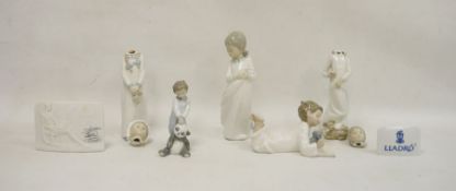Collection of Lladro and Nao figures and plaques, printed and impress marks, comprising a Mao figure
