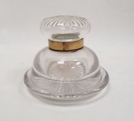 Victorian gilt metal-mounted cut glass inkwell and cover, cut with radiating stars, with hinged gilt