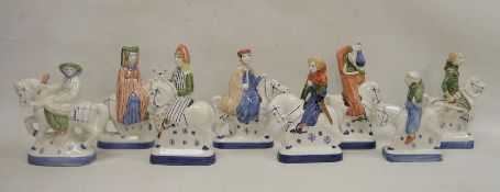 Eight Rye pottery Canterbury Tales figures on horseback, printed blue marks, each bearing label,