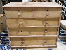 19th century pine chest of two short over three long drawers with moulded edge and plinth base (