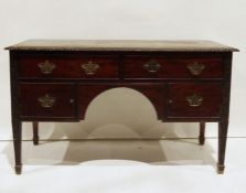 George III-style mahogany sideboard, the rectangular top with carved and moulded edge above two