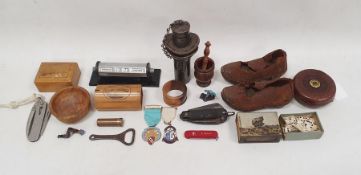 Two Mauchlineware miniature boxes, old pair of leather and metal soled child's clogs, perpetual