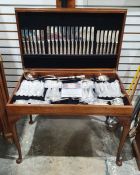 A large oak cased canteen of Sheffield 'EPNS A1' stainless steel flatware, with place settings for