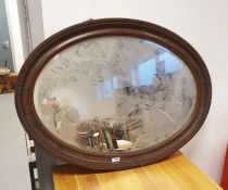 Oval mirror in moulded frame