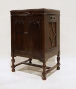 20th century record cabinet, the lift top opening to reveal Garrard deck, the whole on turned and