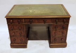 Late 19th century mahogany pedestal desk, the green leather inset top above nine drawers, on