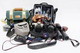 Various cameras to include Canon, Pentax, Olympus, etc.