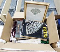 Quantity of textiles, blankets, textile samples, fans, easel, etc. (8 boxes)