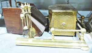 An adjustable fireplace fender a coal scuttle, companion set and a coal box depicting a mealtime