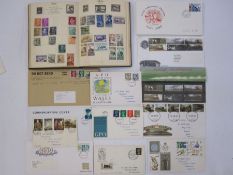 Postboy stamp album with loose GB first day covers, some with railway theme (1 album and some