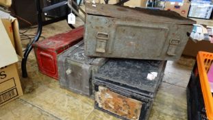 Four metal military storage gun and ammunition boxes