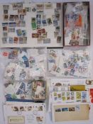 Bag with a thousand + mint and used stamps with stockbook and loose, plus £100 plus mint GB