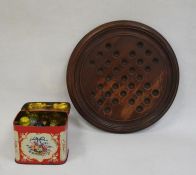 Turned mahogany solitaire board and assortment of marbles