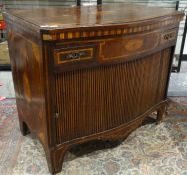 19th century continental cabinet, the serpentine-fronted top with marquetry inlay featuring rope,