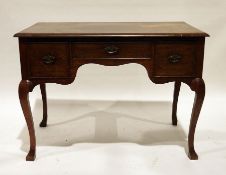 20th century walnut dressing table, the rectangular top with applied moulded edge, three drawers, on