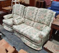 Parker Knoll two-seater sofa and single armchair in foliate upholstery
