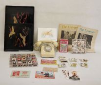 Two modern lacquered Japanese wooden trays, a vintage telephone and a collection of postcards