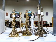 Pair of brass column table lamps, a further pair of brass table lamps and two others (6)