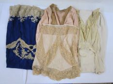 Various vintage lingerie to include a dark blue satin petticoat trimmed with undyed lace, a cream