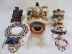 Three Chinese dragon parade hand puppets with movable mouths painted and feather detail also Eastern