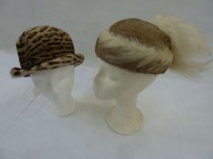 1950's feather hat in fawn and cream with raised feather detail, a vintage leopard skin hat labelled