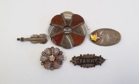 Scottish-style hardstone and agate shaped circular brooch, silver violin brooch, two others and