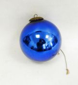 Blue glass kugel witches ball