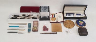 A silver propelling pencil inscribed 