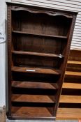 20th century stained oak open bookcase on plinth base, 94cm x 198cm