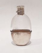 Victorian silver and glass hip flask with silver-mounted bayonet cap, glass body and silver base,