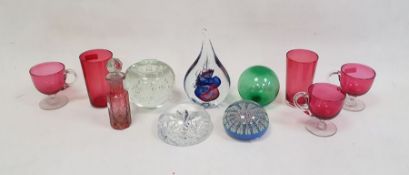 Adam Jablonski teardrop-shaped glass paperweight with internal bubbles and blue and red colourway, a