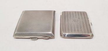 Two 20th century silver cigarette cases, one with engine-turned decoration and gilt washed interior,
